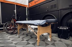 The physio bench within the Gstaad-Scott UCI Downhill World Cup group's coach in Leogang, Austria