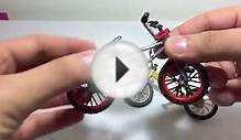 Red and yellow bikes for children. Finger BMX